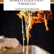 slice of baked eggplant parmesan with cheese pulling from it