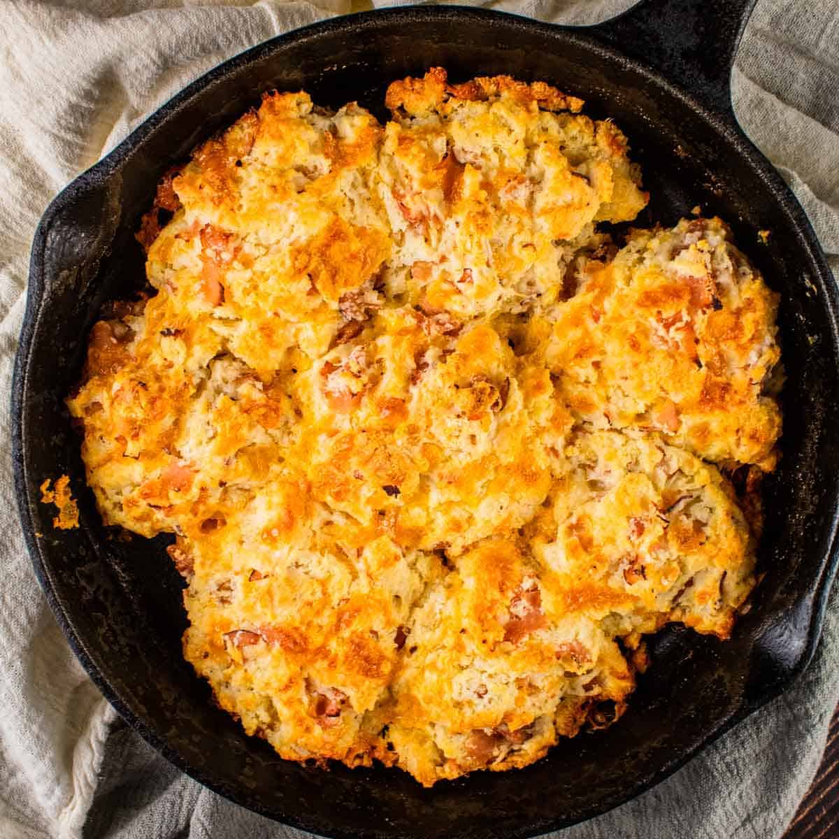 ham and cheese drop biscuits in a cast iron skillet