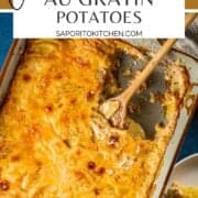 baking dish of au gratin potatoes with a wooden spoon scooping a serving