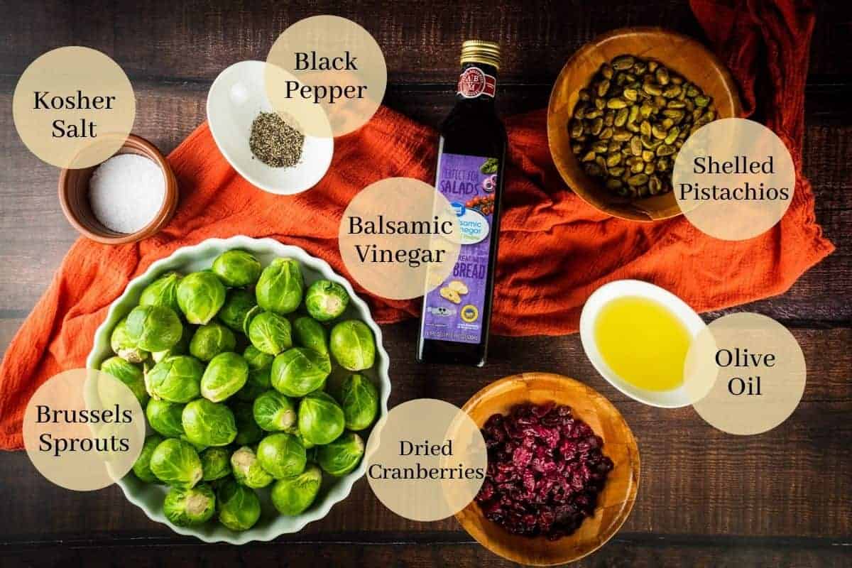 black pepper, kosher salt, balsamic vinegar, shelled pistachios, dried cranberries, olive oil and fresh brussels sprouts