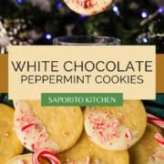 cookies covered in white chocolate and peppermint next to candy canes
