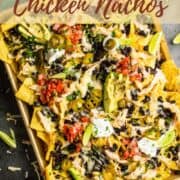 sheet pan shredded chicken nachos loaded with toppings