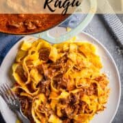 dutch oven of short rib ragu next to a plate of pappardelle pasta with ragu.